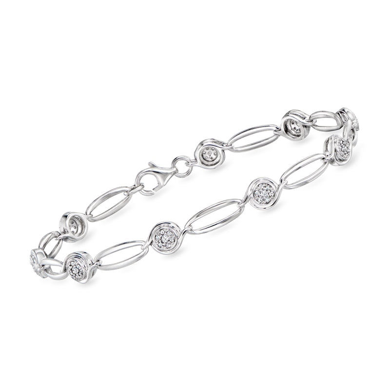 Sterling silver oval-link bracelet with round diamond cluster charms, clasp closure