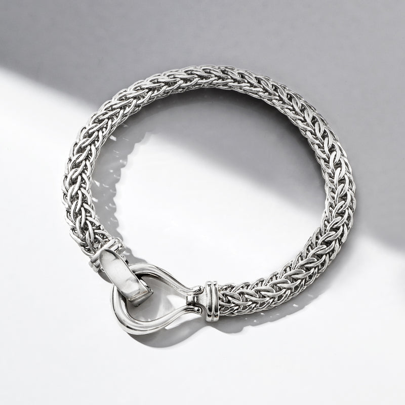 Sterling silver chain bracelet with polished U-shaped clasp and interwoven links