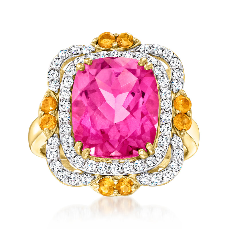 Pink cushion-cut gemstone ring with white stone halo and yellow side accents