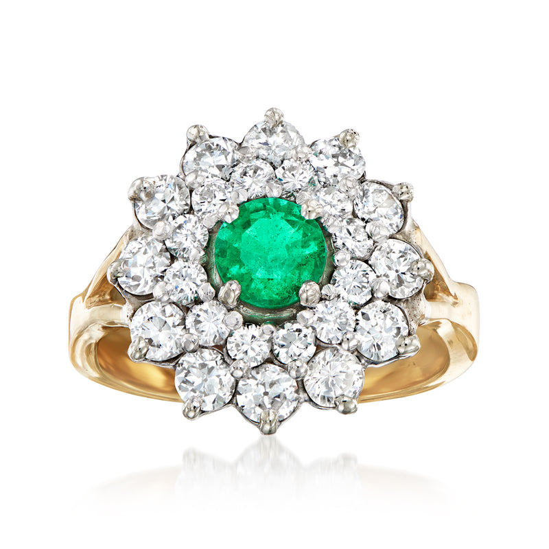 Vintage dinner ring with emerald-cut green center and diamond cluster, yellow gold band