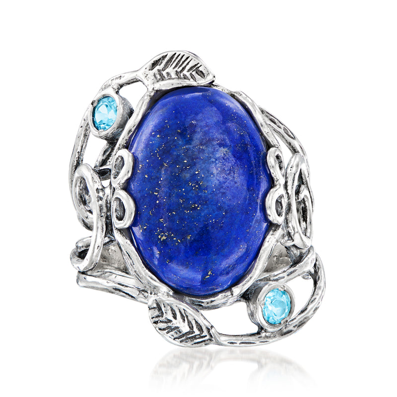 Sterling silver ring with oval blue gemstone and small round blue accents