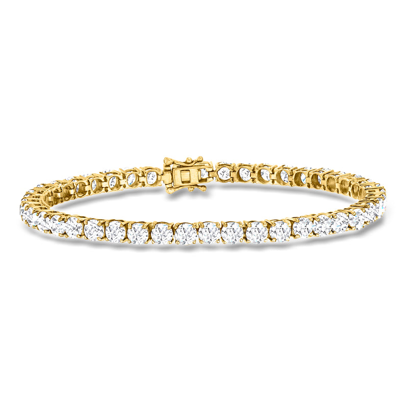 Yellow gold tennis bracelet with round white topaz stones and clasp
