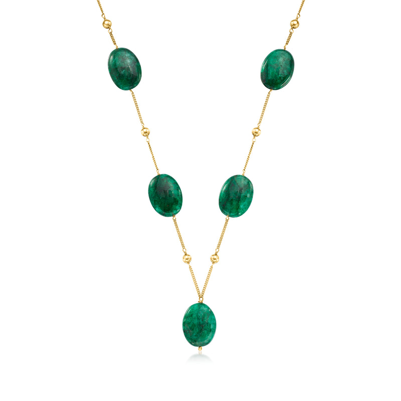 Gold-tone bead station necklace with five oval green gemstone-like drops