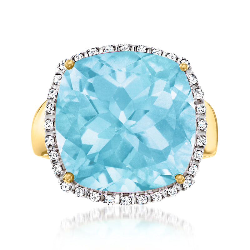 14kt yellow gold ring with sky blue topaz center and diamond halo with gold corner prongs