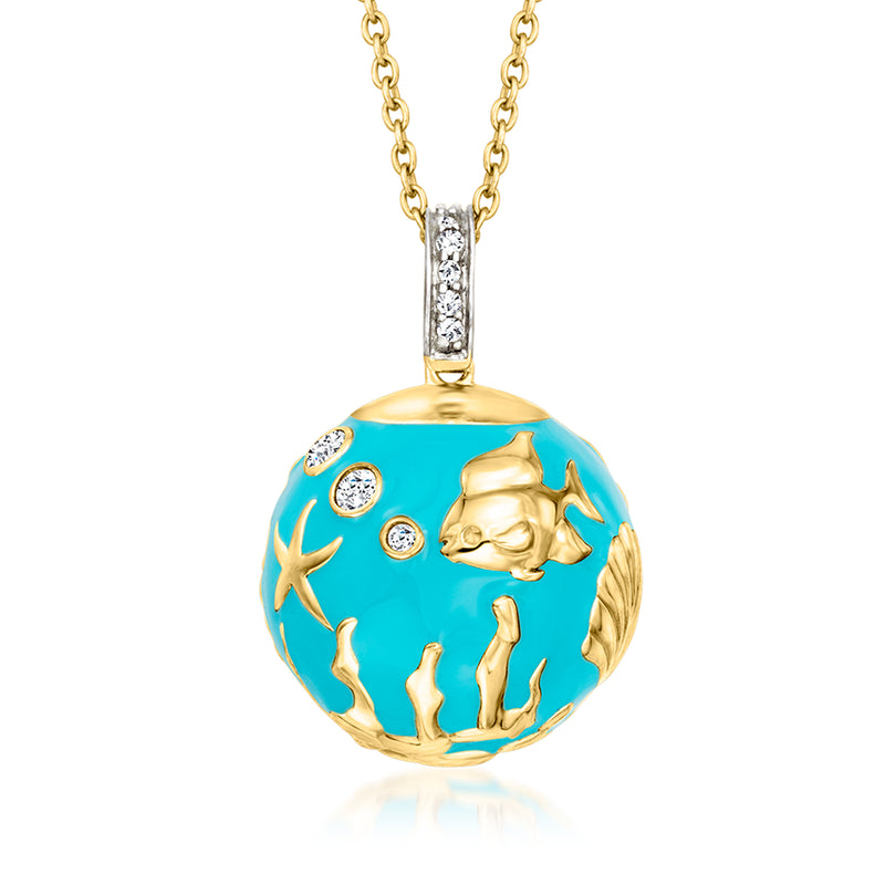 Gold-tone pendant necklace with round blue enamel sea life scene and small white stones
