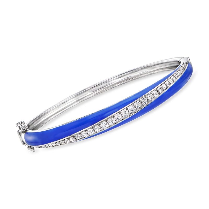 Sterling silver bangle bracelet with blue enamel center and white topaz accents