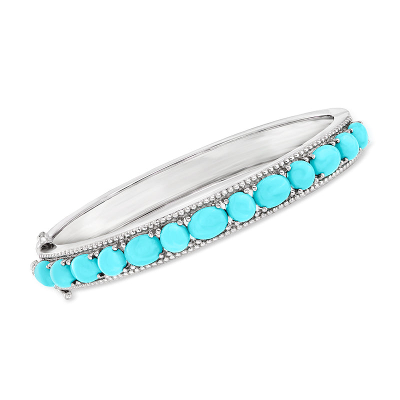 Turquoise bangle bracelet in sterling silver with oval turquoise stones and beaded edges