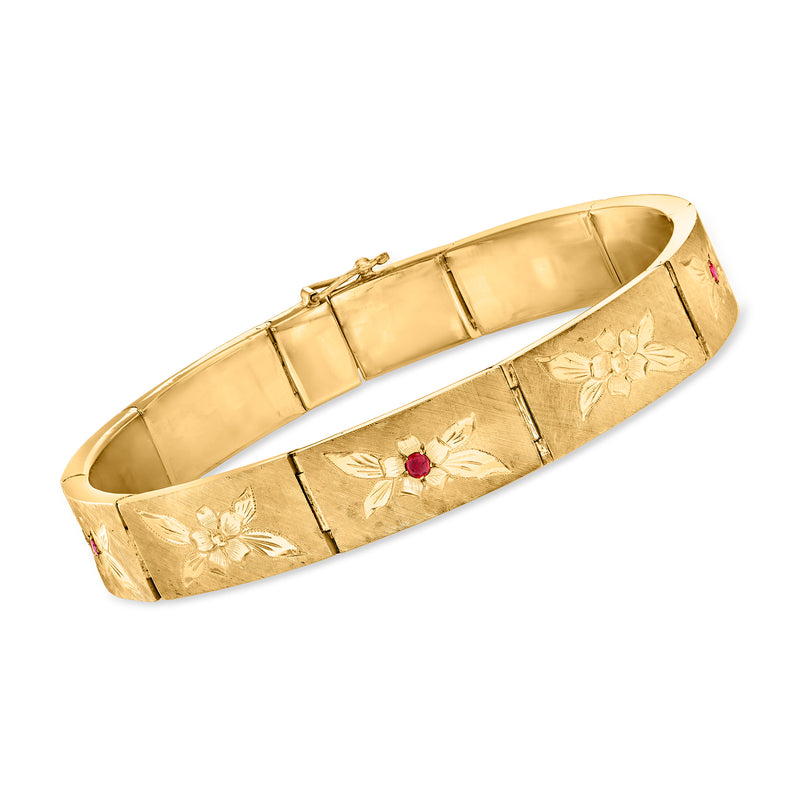 Vintage yellow gold floral-link bracelet with ruby center and engraved flower details