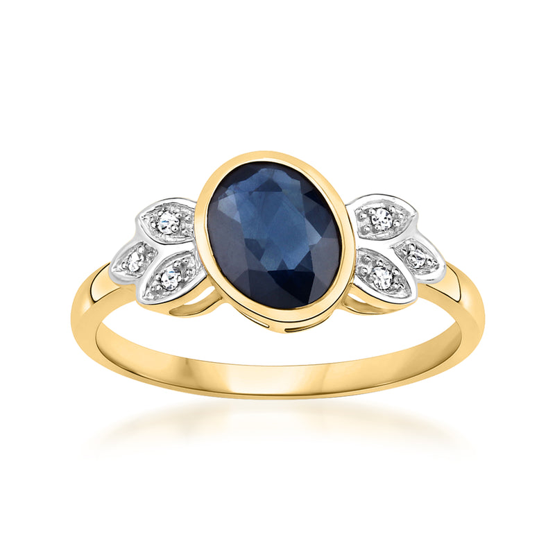 14kt yellow gold leaf ring with oval dark blue sapphire and diamond accents