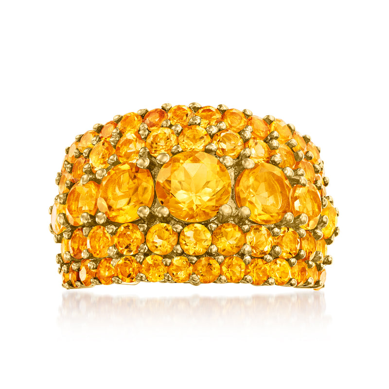 Gold-tone citrine multi-row ring with oval center gemstone and round side stones