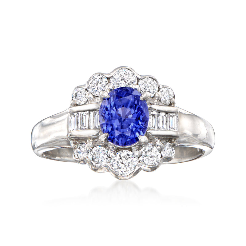 Platinum oval sapphire and diamond ring with baguette side stones