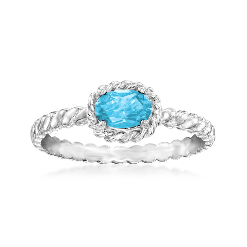 Sterling silver twisted ring with Swiss blue topaz oval center stone