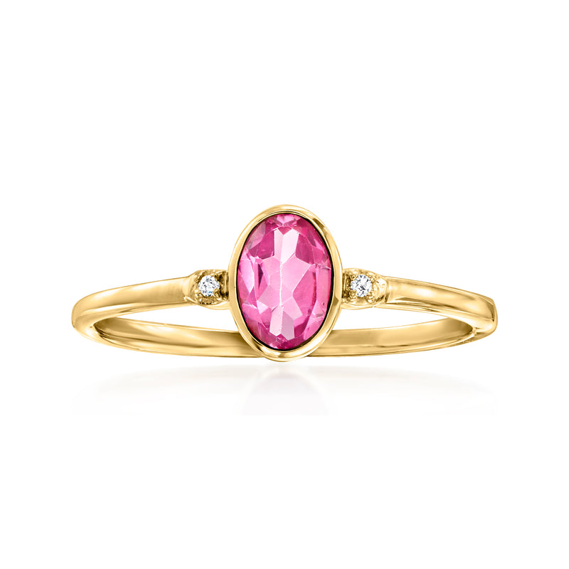 14kt yellow gold ring with oval pink topaz center and small diamond side accents