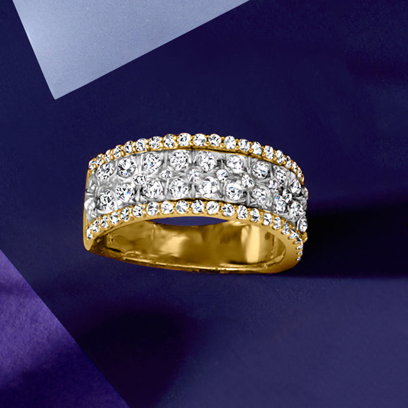 Two-tone gold diamond cluster ring with rows of round stones, gold rim visible