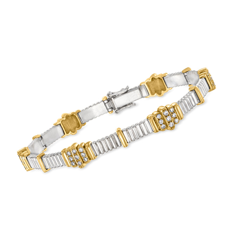 Two-tone gold diamond ribbed section bracelet with row of round diamonds and bar links