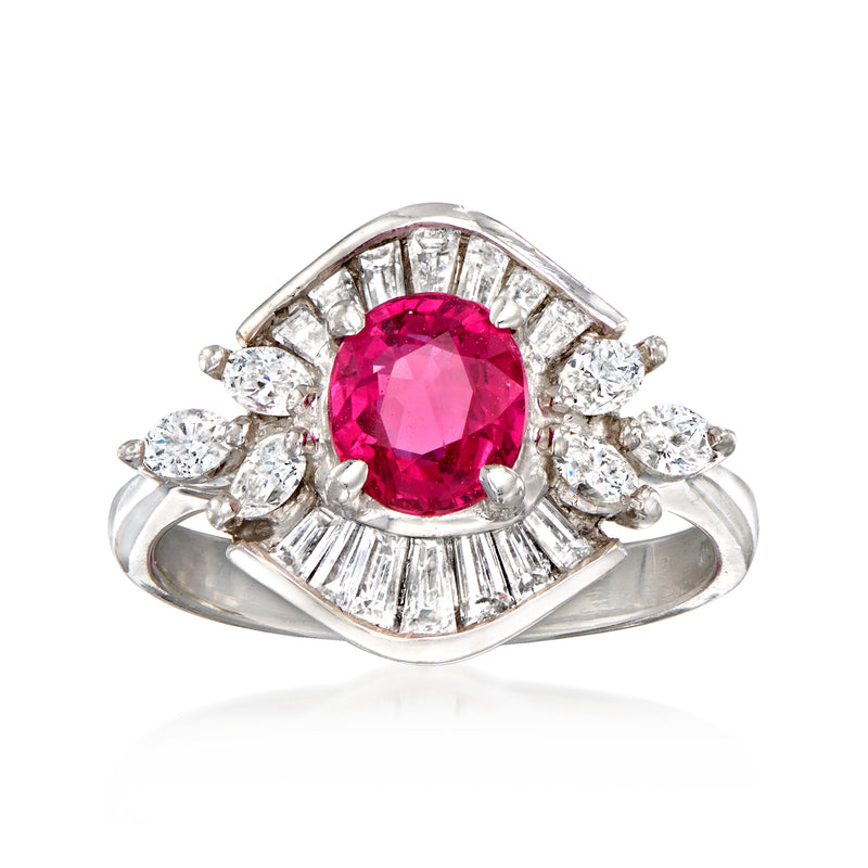 Platinum dinner ring with oval ruby center and diamond halo accents