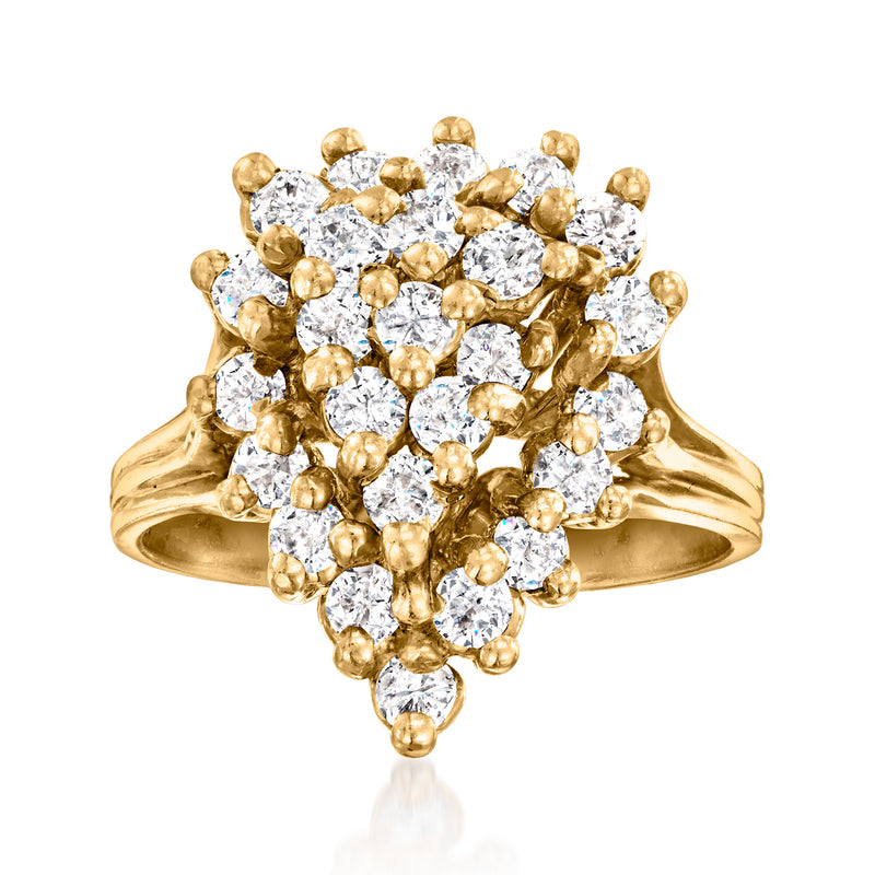 Vintage yellow gold diamond cluster ring with multiple round bezel-set stones
