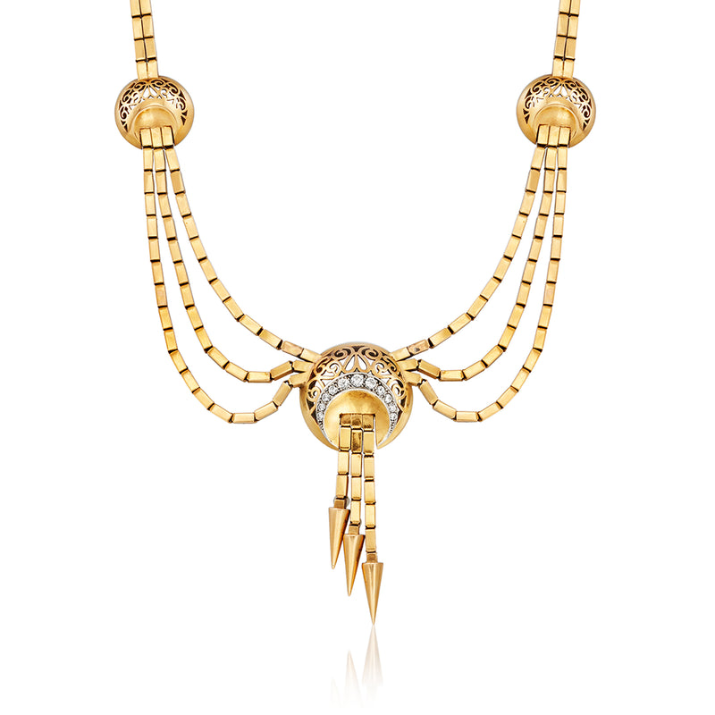 Vintage yellow gold draped necklace with central jeweled pendant and dangling accents
