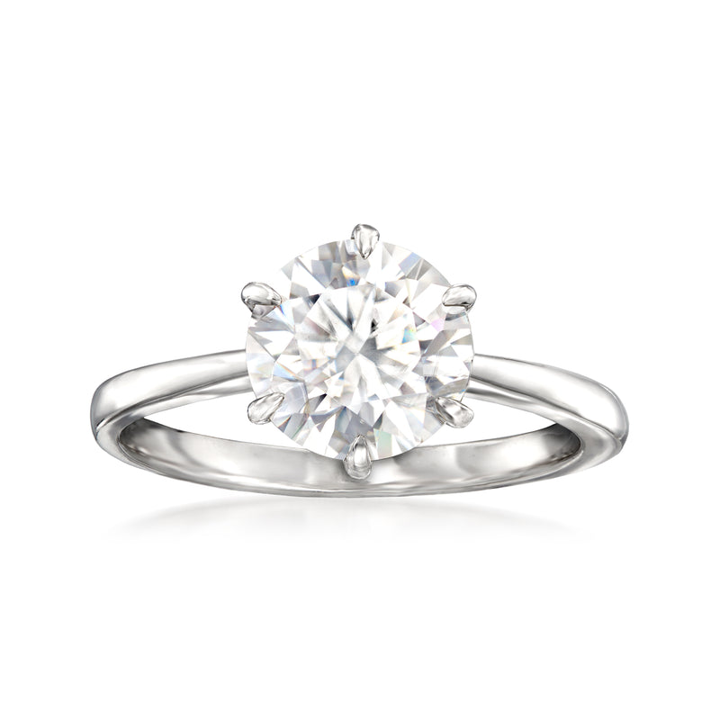 Sterling silver solitaire ring with round moissanite center stone, four prongs
