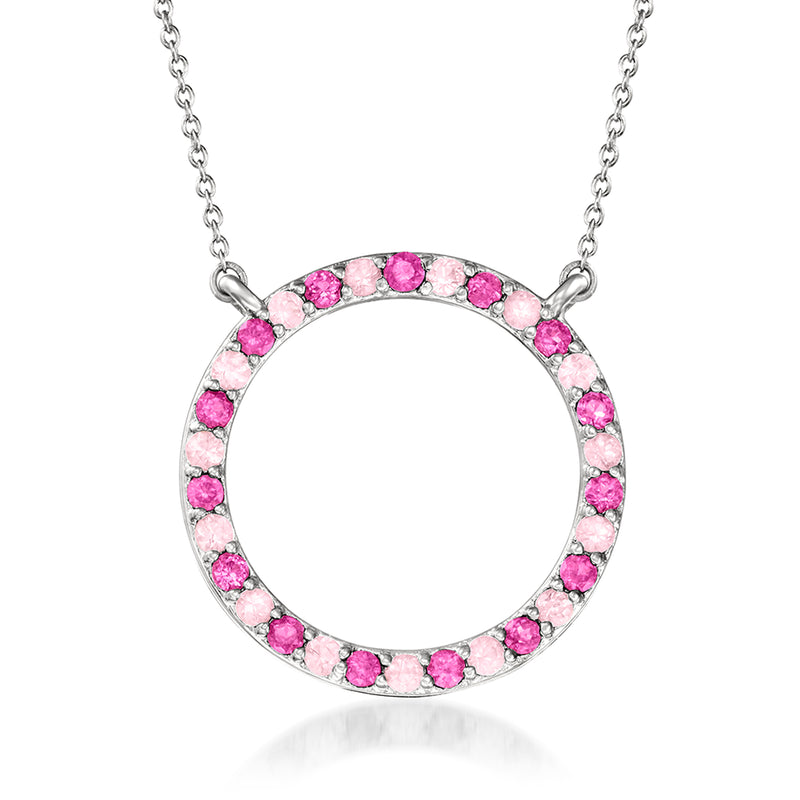 Sterling silver eternity circle necklace with pink gemstones around a round pendant