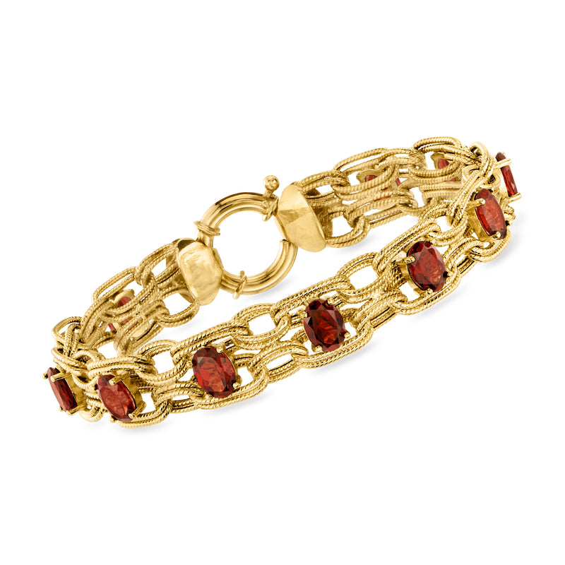 18kt gold over sterling bracelet with oval garnet stones in linked gold chain