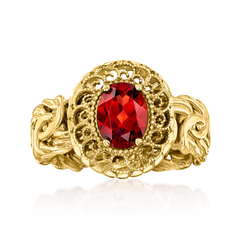 Byzantine-style gold ring with red faceted gemstone and ornate filigree setting
