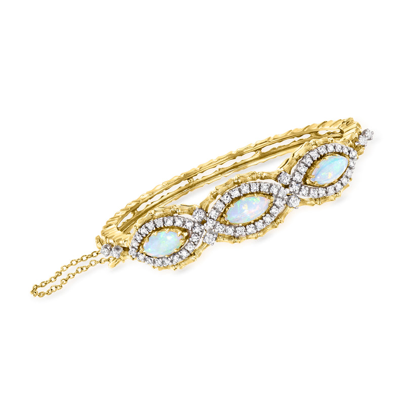 18kt yellow gold bangle bracelet with oval opal centers and diamond halo links