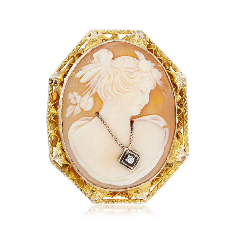 Oval brown shell cameo ring in 14kt yellow gold with portrait and single diamond