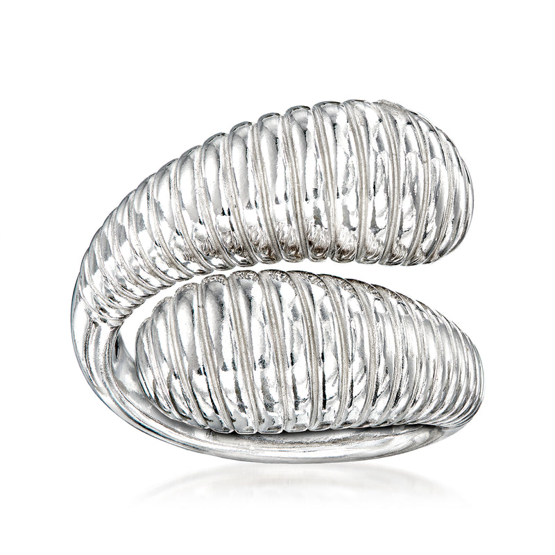 Sterling silver ribbed bypass ring with vertical ridged bands, interlocking open design.