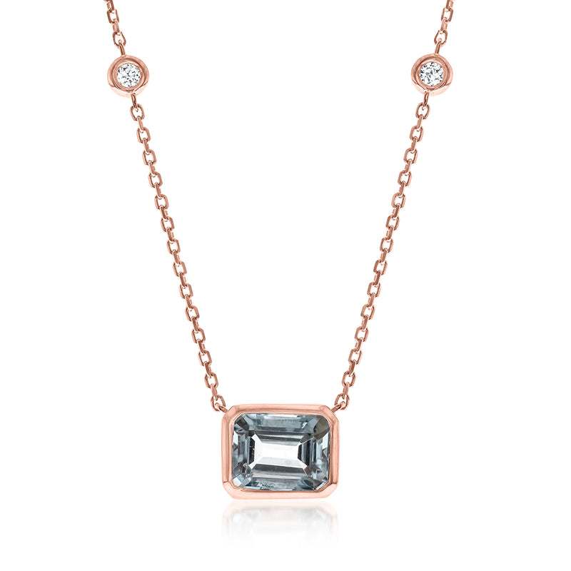 14kt rose gold necklace with faceted aqua-toned square pendant and small round diamond accents