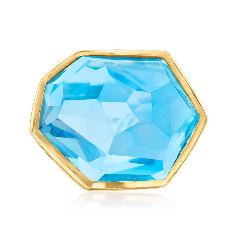 18kt yellow gold ring with octagonal sky blue topaz gemstone