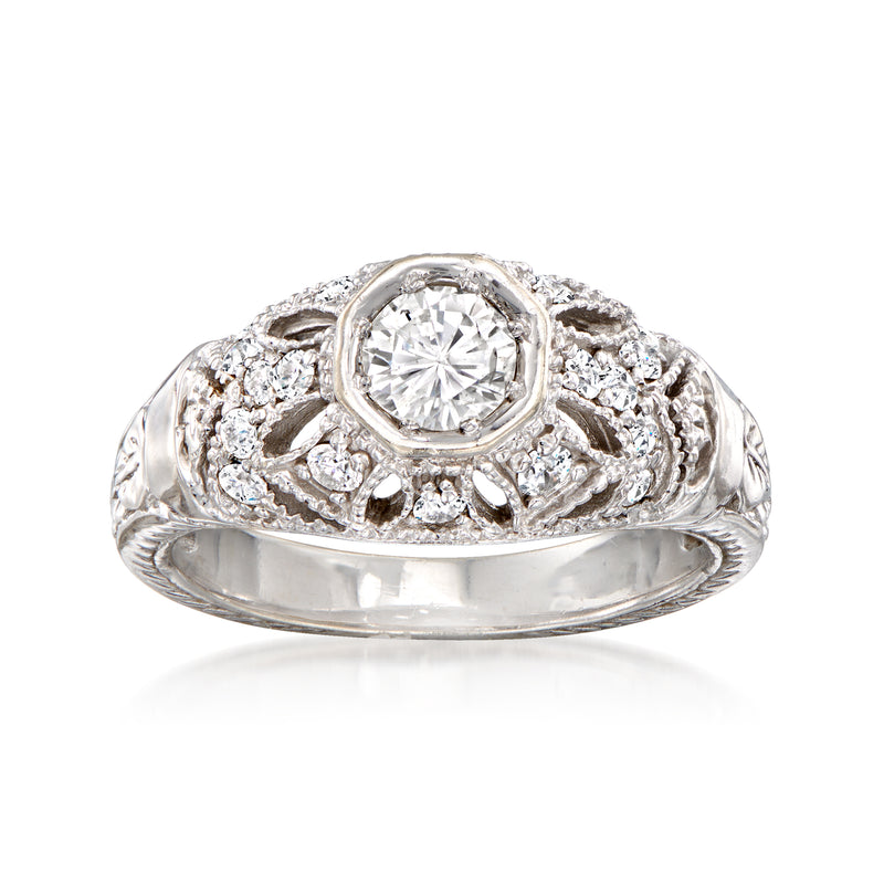 Vintage 14kt white gold diamond filigree ring with round center stone and halo