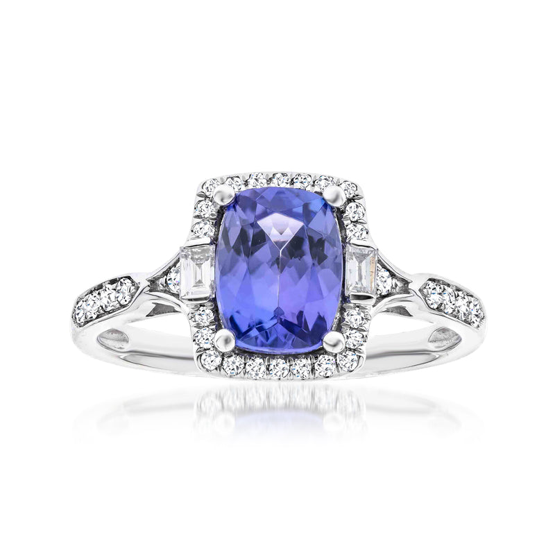 14kt white gold ring with oval blue tanzanite center and small diamond side stones