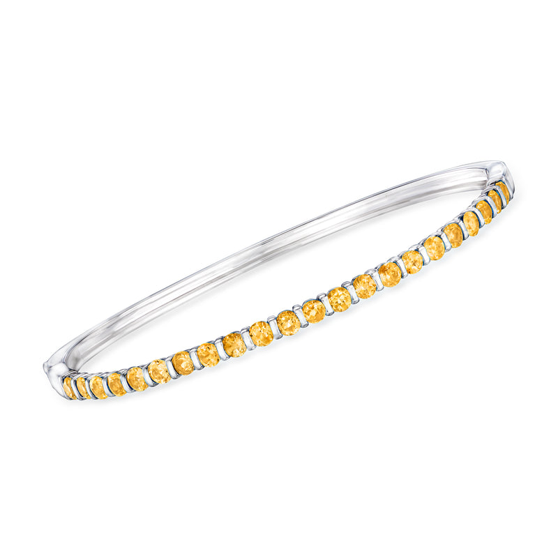 Sterling silver bangle bracelet with oval citrine stones in a continuous row