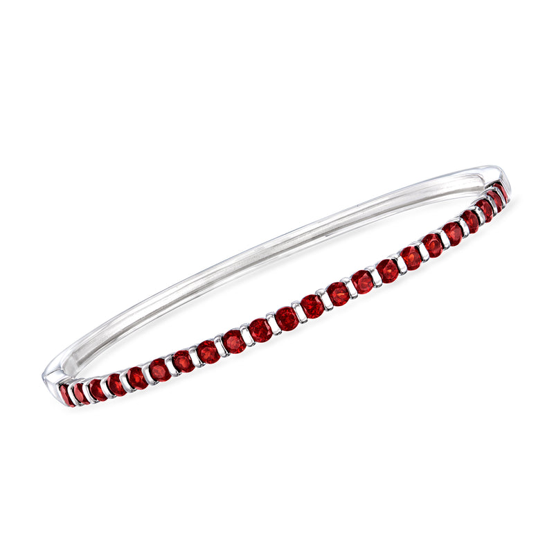 Sterling silver garnet bangle bracelet with a row of red gemstone accents