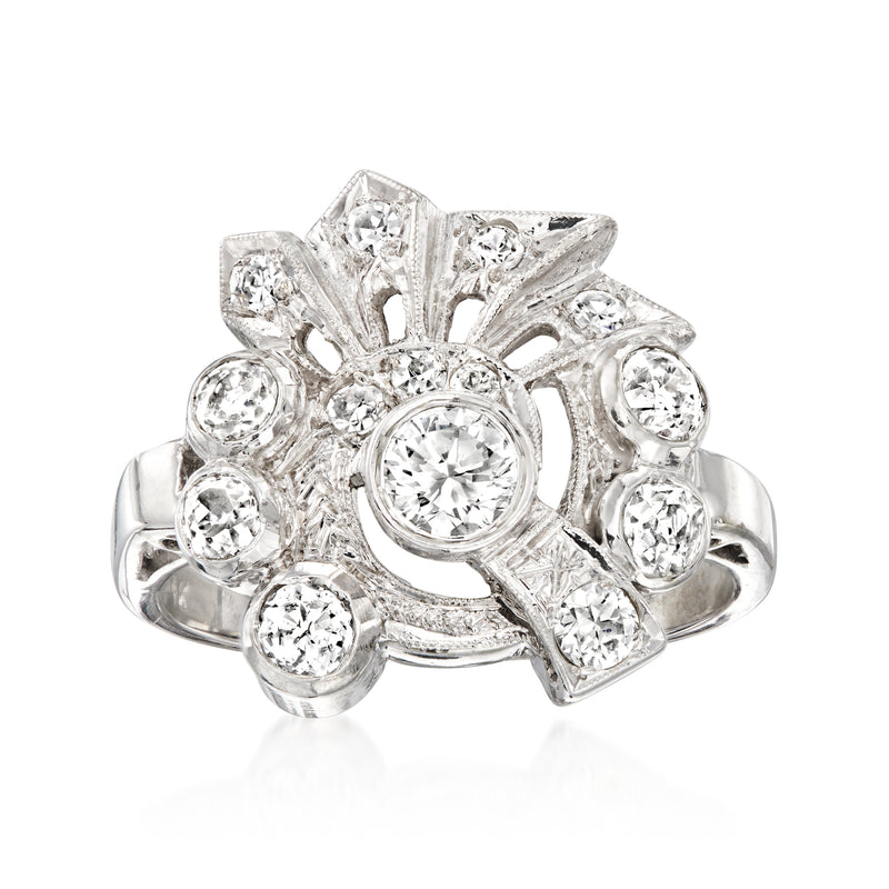 Vintage 14kt white gold diamond fashion ring with round halo and side stones