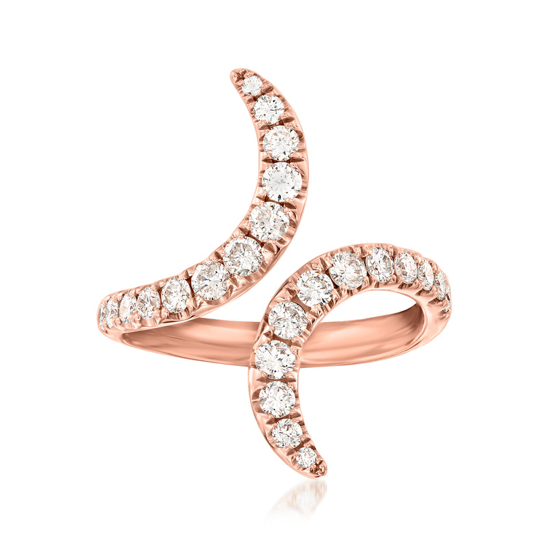 Vintage rose gold bypass ring with oval center diamond and round diamond accents
