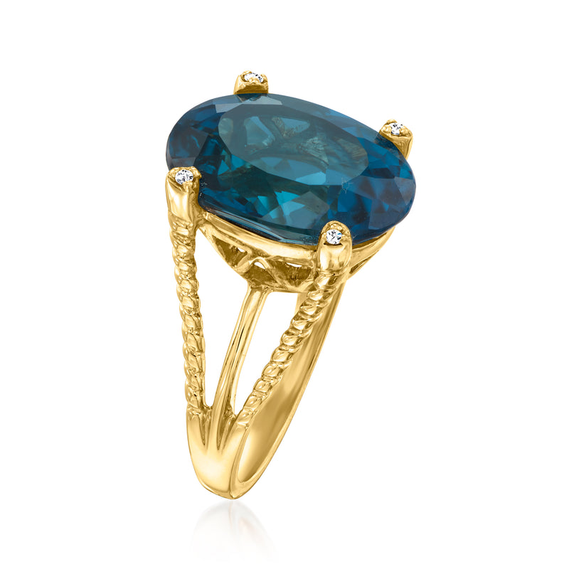 Blue topaz oval ring with twisted gold prongs and small diamond accents