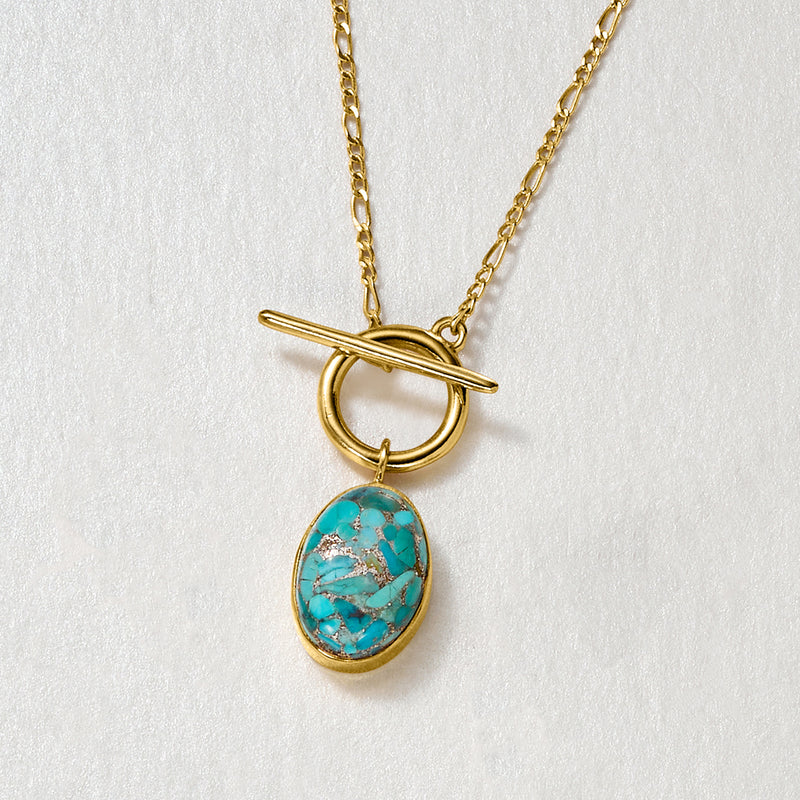 Gold toggle necklace with oval turquoise pendant and linked chain