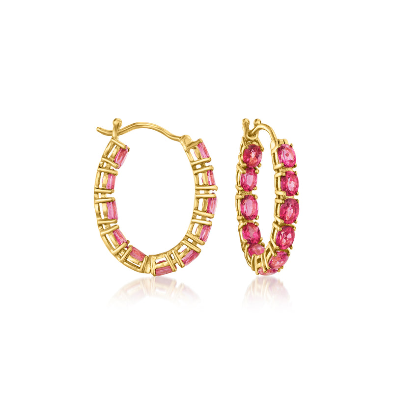 Gold hoop earrings with pink gemstones, inside-out bezel-set design