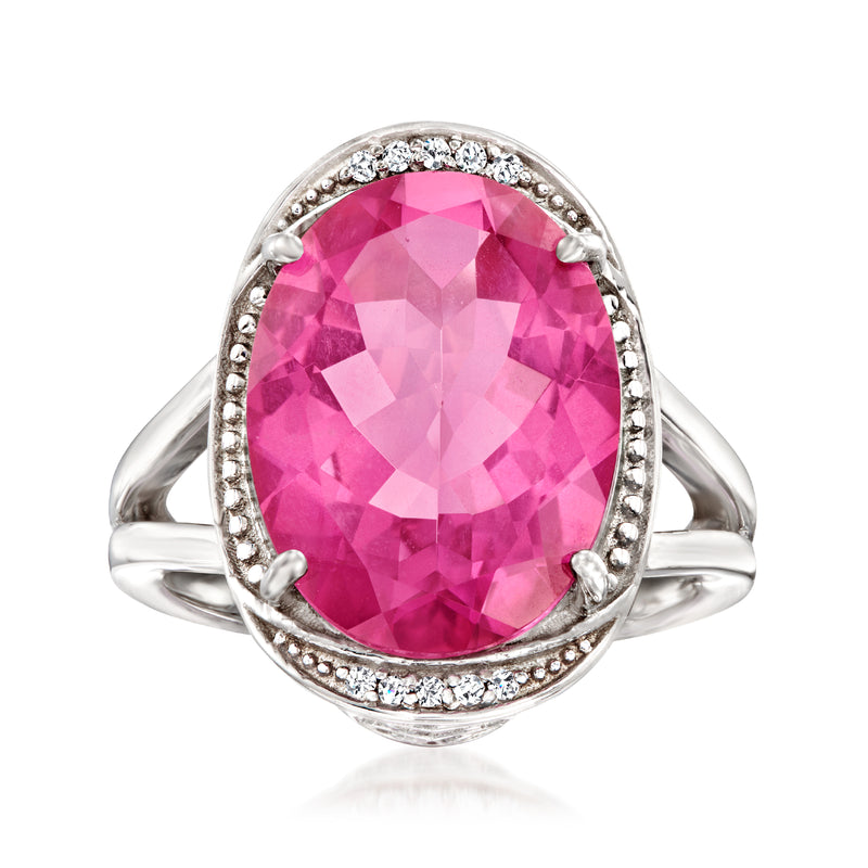Oval pink topaz ring with white zircon halo, sterling silver band