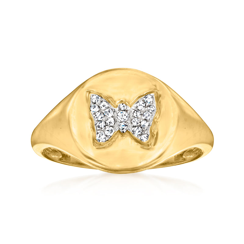Gold signet ring with butterfly design and round diamond accents, top view