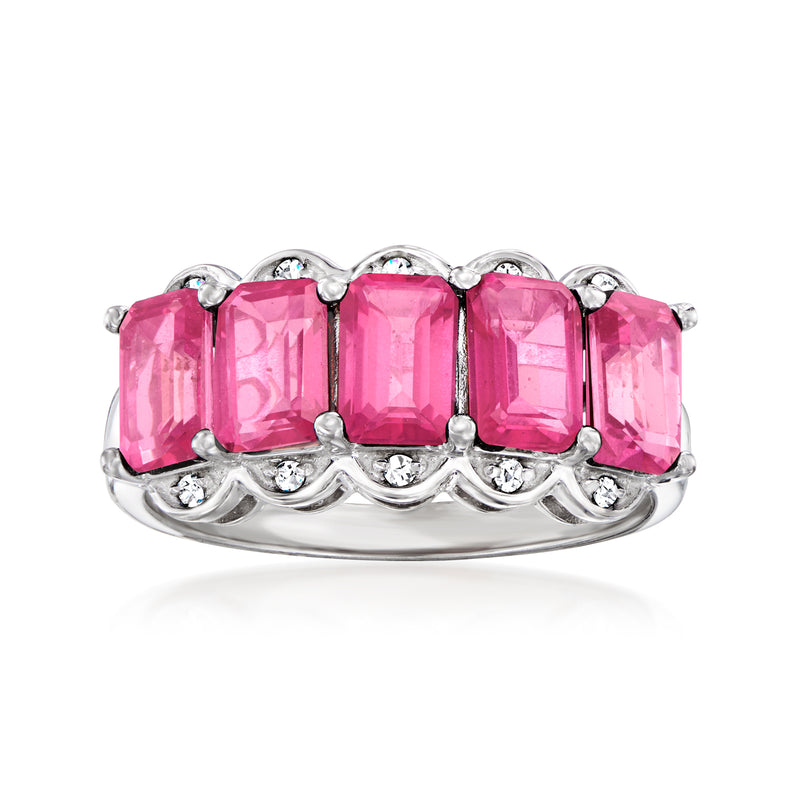 Sterling silver ring with pink topaz center and diamond accents, five-stone style