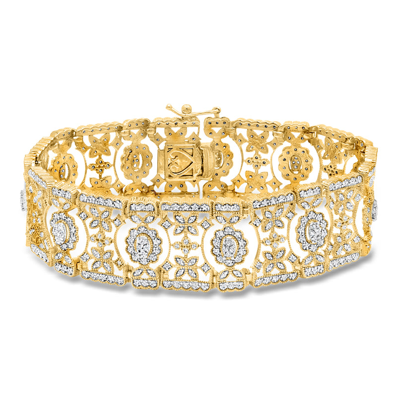 Diamond openwork floral bracelet in gold with clear stone accents, wide link design