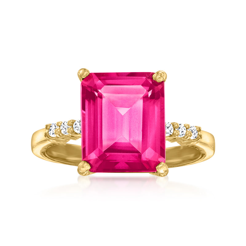 Gold ring with large emerald-cut pink topaz and small white side stones