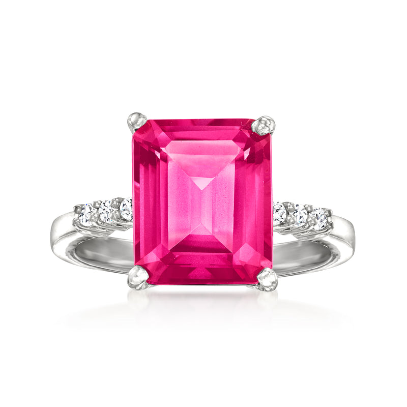 Sterling silver ring with large pink topaz center stone and small white accents