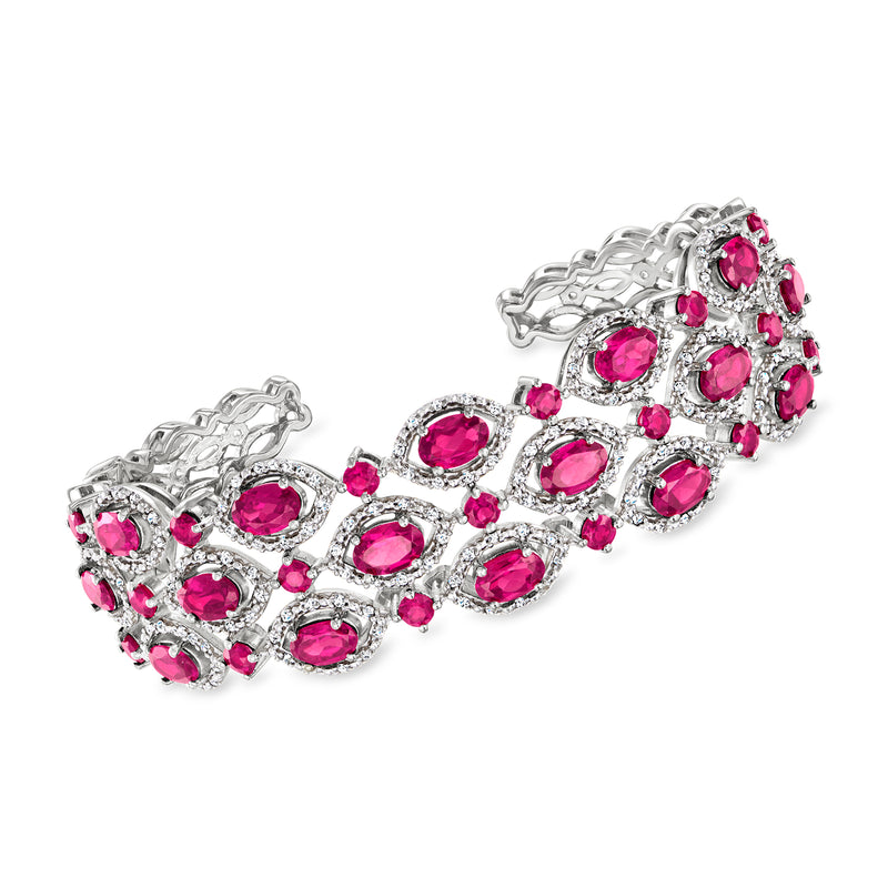 Sterling silver cuff bracelet with pink oval gemstones and sparkling clear stones