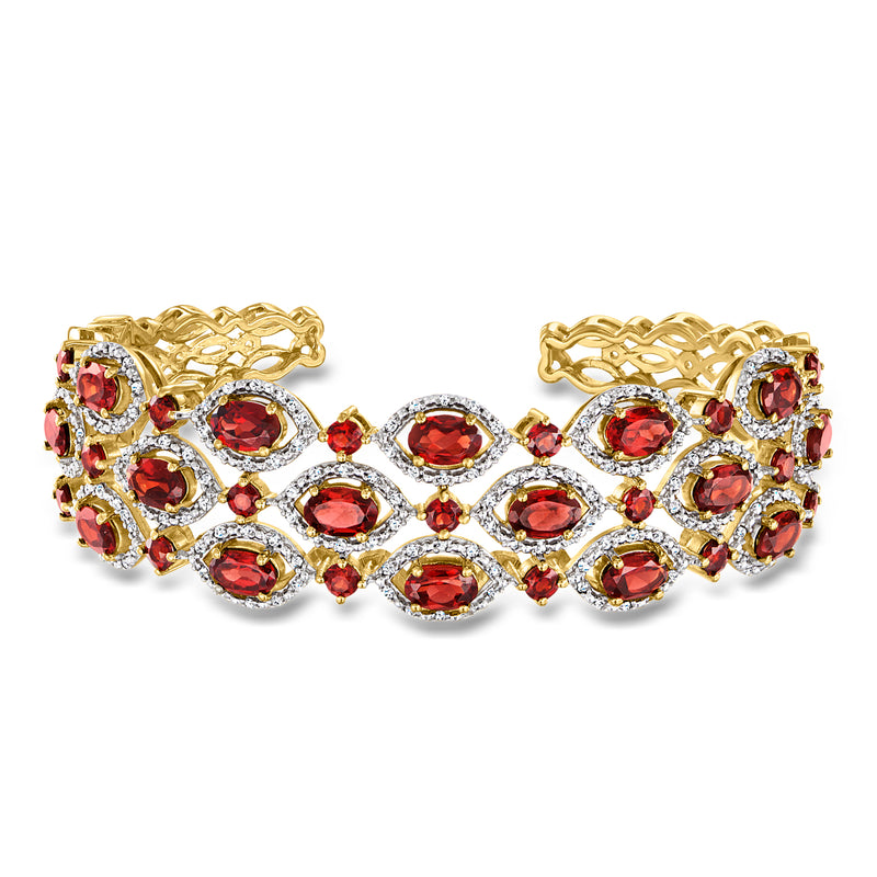 Gold over sterling cuff bracelet with red oval garnets and white zircon halos, hinged