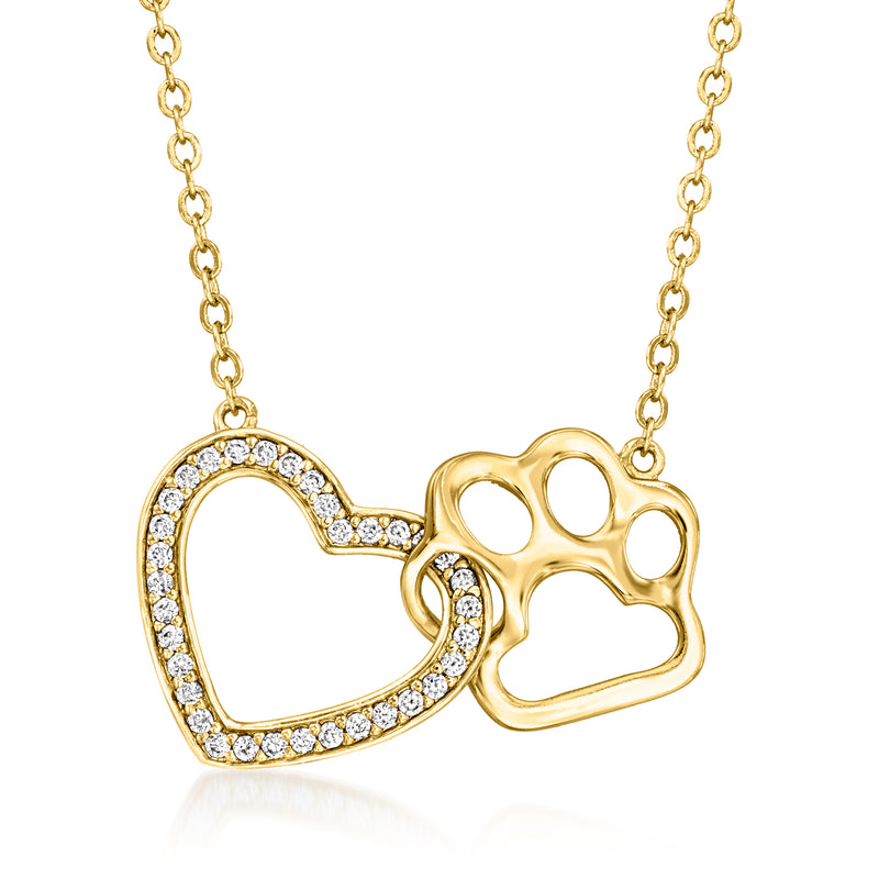 Gold heart pendant necklace with paw-print cutout and white gemstone accents, link chain