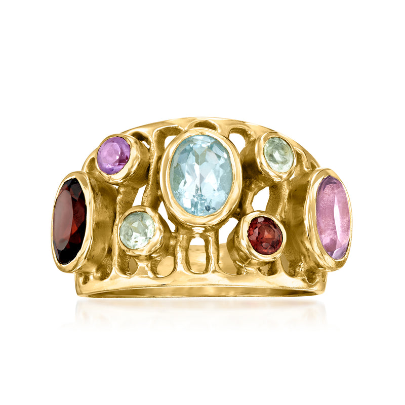 Gold-tone gemstone ring with oval blue center stone and purple, red, green accents.